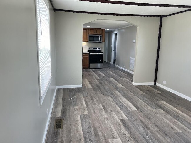 Living Room overlooking toward kitchen - 403 Big Hill Rd