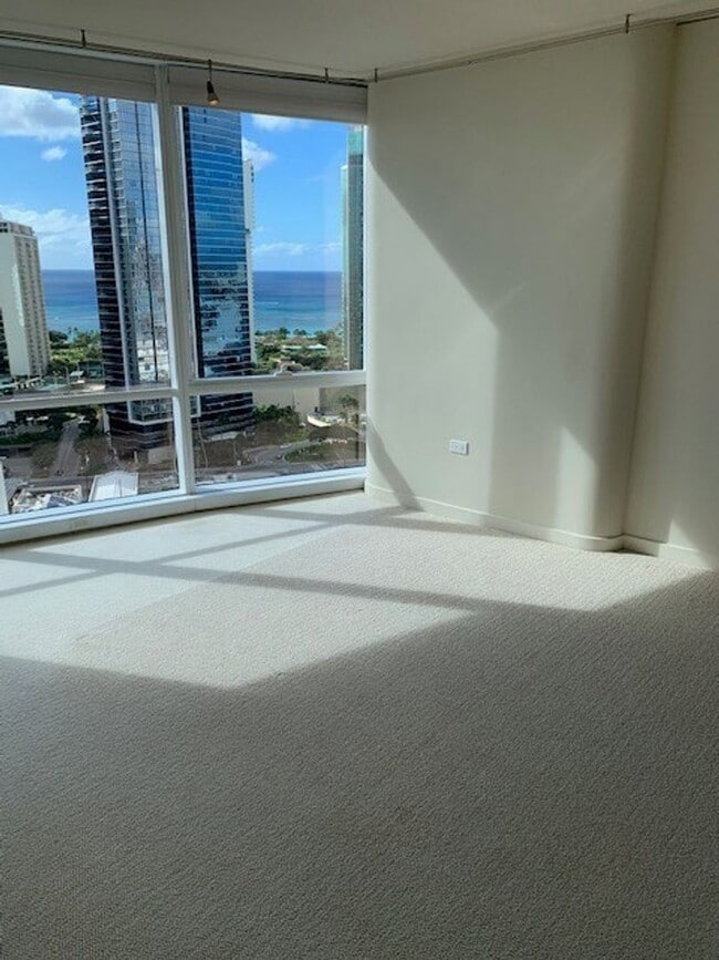 Building Photo - Moana Pacific - 2 bedroom plus den, 2 bath Condo with 2 parking - avail now!