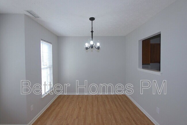 Building Photo - 3208 Mango Dr