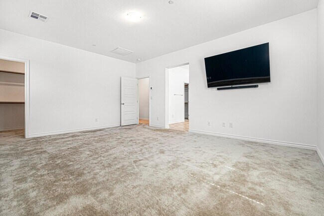 Building Photo - Modern 4-Bedroom Home in Gated Henderson Community | Built 2022