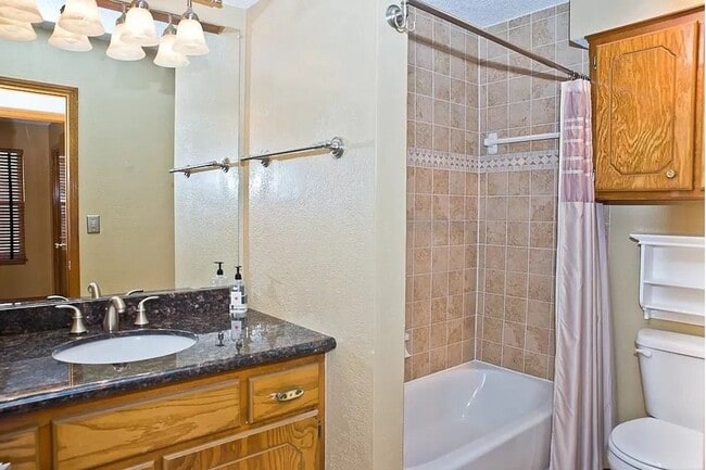 Building Photo - Updated Gem with Shop & Storm Shelter