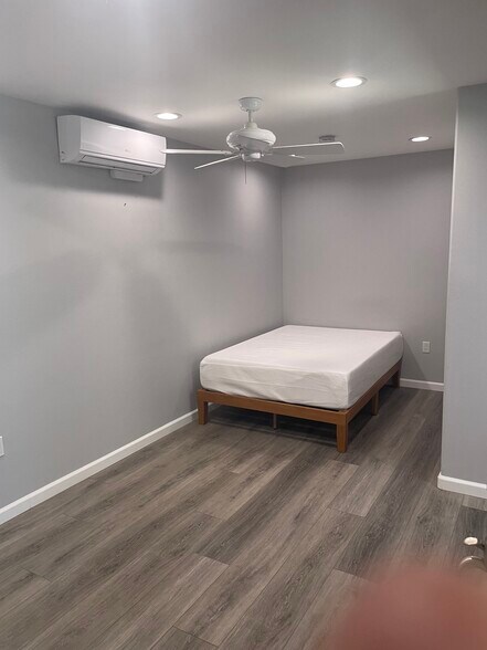 Opposite of TV Wall. This is a new double bed-a queen size also fits. - 33742 Alcazar Dr