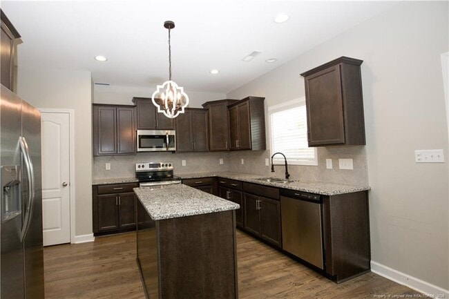 Building Photo - 5709 Pondhaven Dr