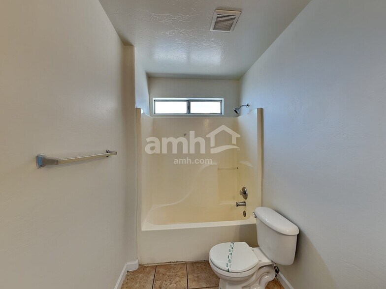 Building Photo - 6034 S Lostan Ave