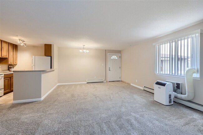 Building Photo - Top-floor, 2-bed 1-bath condo located near the highly desirable Old Town Arvada!