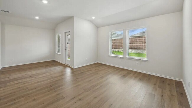Building Photo - Beautiful new 4-bedroom, 2-bath home with an open floor plan, granite kitchen, two-car garage, an...