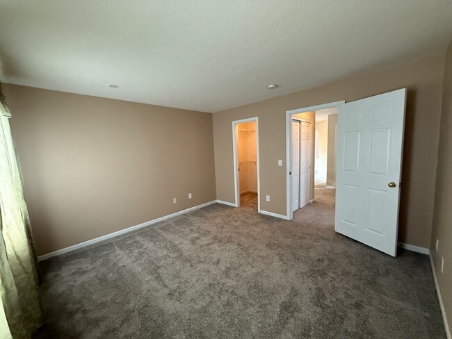 Bedroom 2 with walk-in closet - 6560 Brier Lake Rd