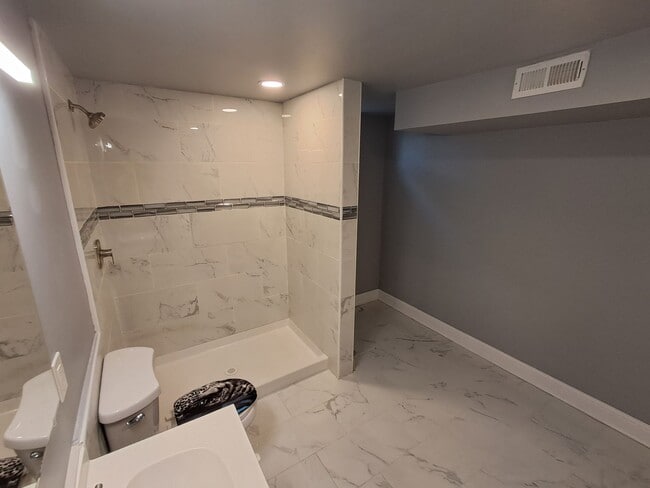 Building Photo - COMING SOON: Fully Renovated, Full of Charm — Space, Style, and a Porch Swing Vibe