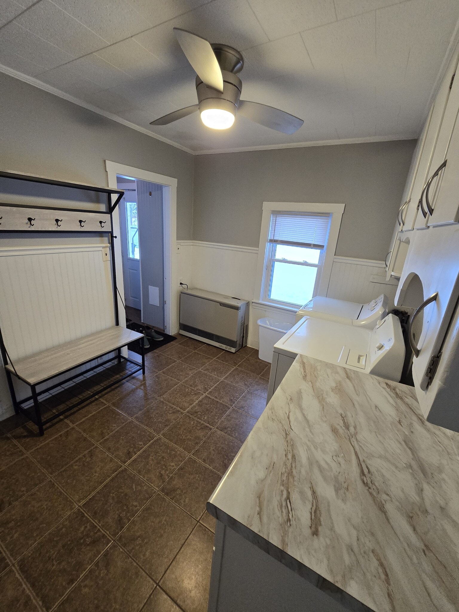 Laundry room and entrance from back door of the house - 332 Broadway