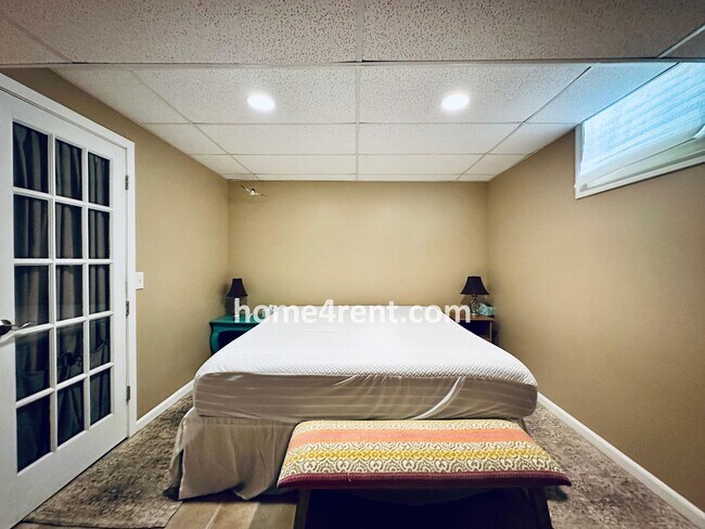Building Photo - A Lovely, Four Bedroom Lenexa Home w/ Wood...
