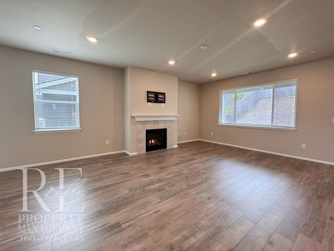 Building Photo - Warm & Inviting 4-Bedroom Home with Vaulted Ceilings, Loft, Fireplace & Fenced Backyard