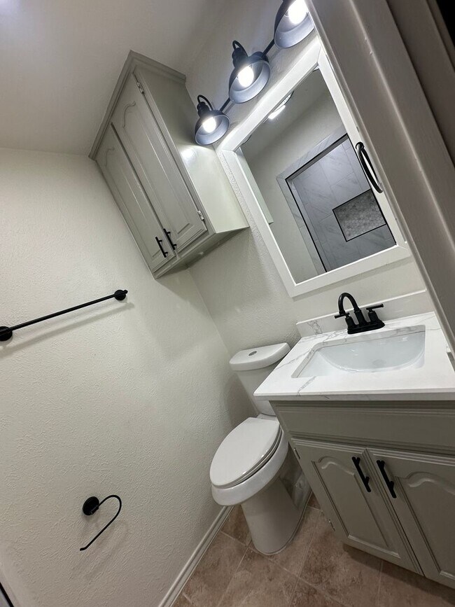 Building Photo - PLANO 4-bed 3-bath 2-car garage with huge workshops
