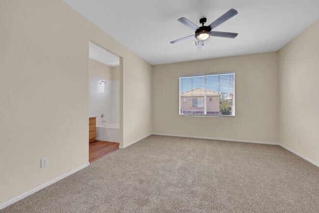 Building Photo - This beautifully updated 2-bedroom home is nestled in a gated community