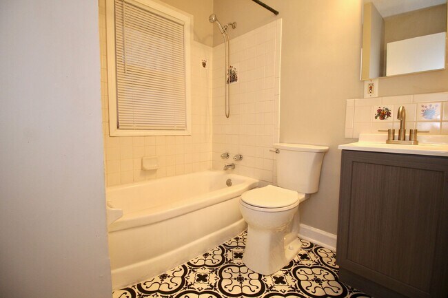 Building Photo - Adorable 3-brm brick ranch with lots of natural light, family room/den, attached garage