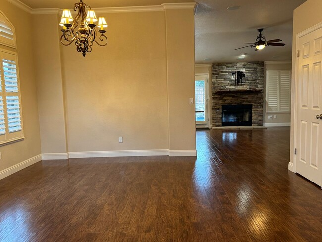 Building Photo - Immaculate home with pool & hardwood floors!
