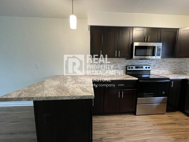 Building Photo - Modern Comfort Meets Peaceful Living