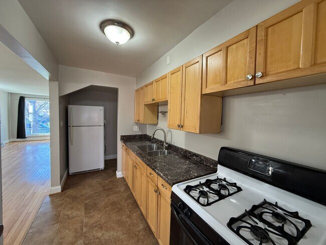 Building Photo - End Unit 3BR Townhome in Dundalk | Covered Porch, Fenced Yard, Central A/C + Off Street Parking