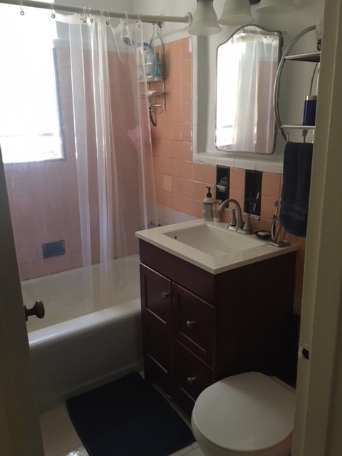 Bathroom with tub - 105-25 67th Ave