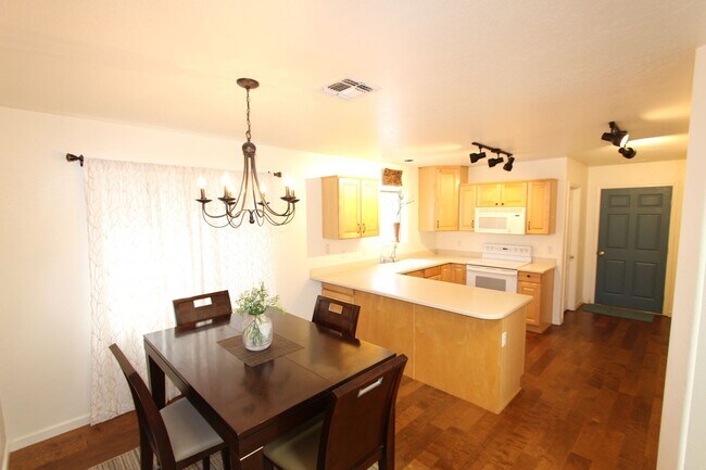 Building Photo - Spacious 3-Bedroom Townhouse with Main-Level Primary Suite
