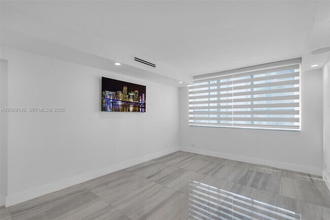 Building Photo - 5005 Collins Ave