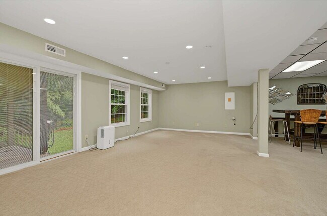 Building Photo - Spacious 4-Bed Oasis with Basement in Cary