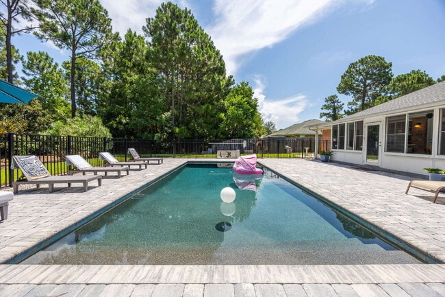Building Photo - "Coastal Elegance Awaits: Spacious 4-Bed Oasis with Granite Touches on Shipwreck Road"