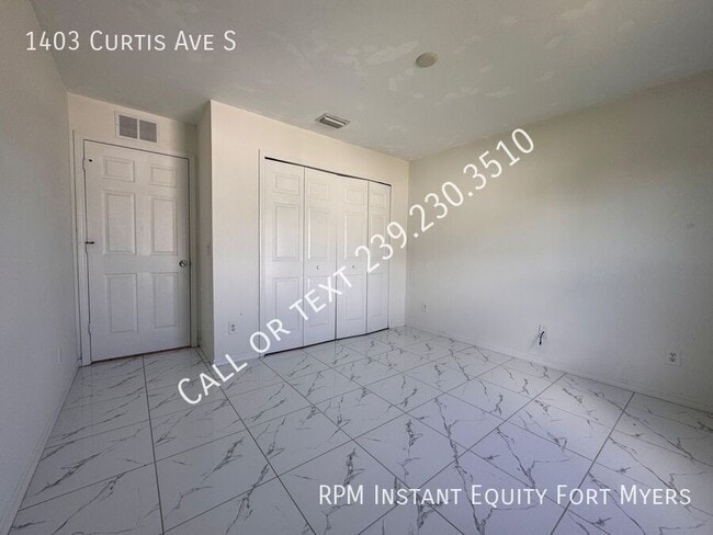 Building Photo - 1403 Curtis Ave S