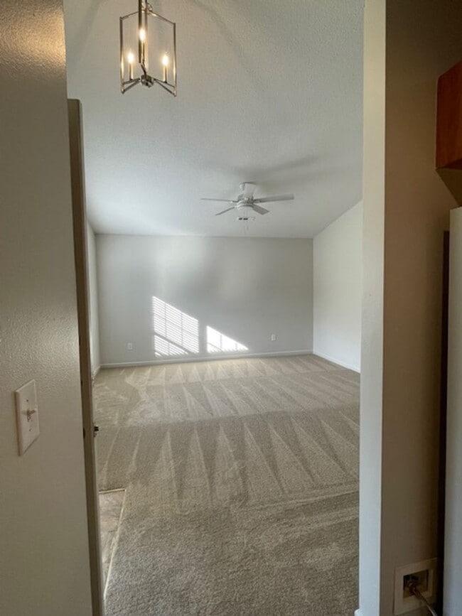 Building Photo - Single Story - 3 bedrooms, 2 baths, spacious living room, kitchen & a 2 car garage, located on a ...