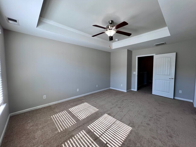 Building Photo - 3 bed/2.5 bath at end unit townhome in Berkeley Walk at Savannah Quarters with garage