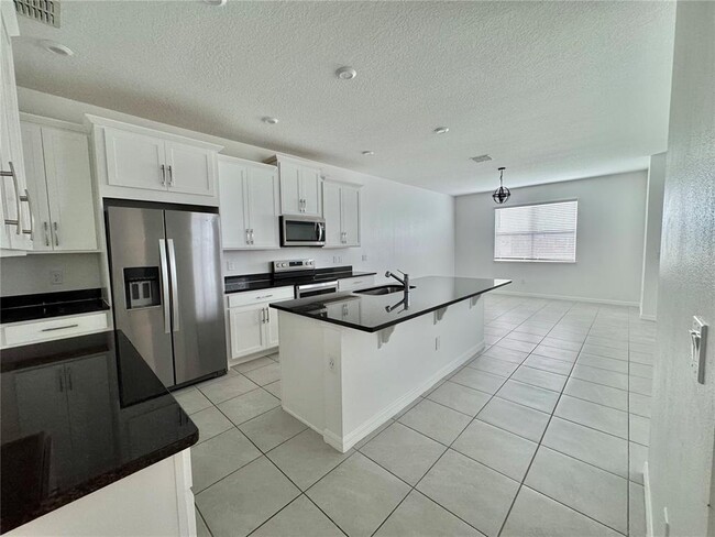 Building Photo - 8973 Matriarca Aly