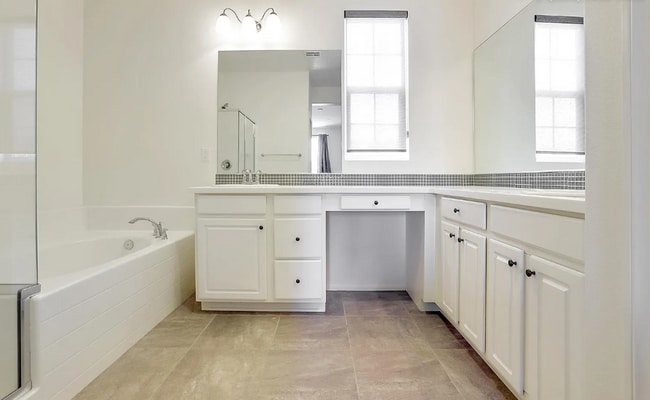 Building Photo - This gorgeous 3-bedroom, 3.5 bath townhome...