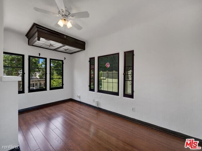 Building Photo - 3 br, 2 bath Condo - 6135 W 6th St