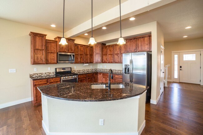 Building Photo - Bright & Spacious 3 Bed + Loft | 3-Car Garage in North Fort Collins