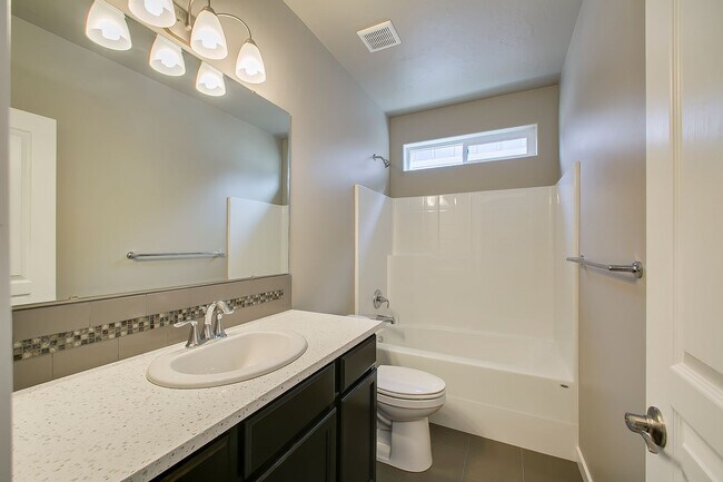 Building Photo - Close to Micron!  5 Bedroom 3 Full Baths -...