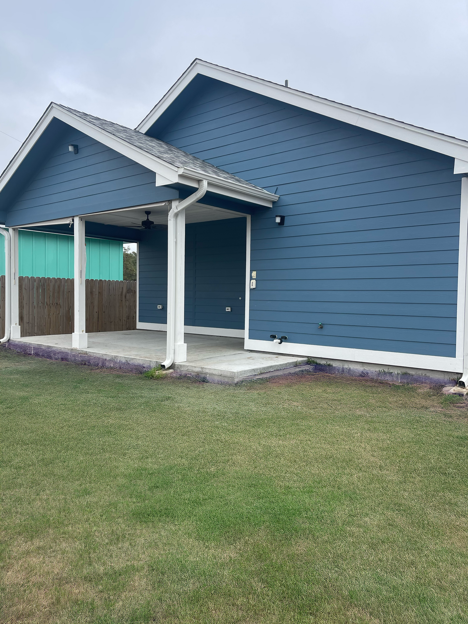 Back Patio Area with Ceiling Fan - 717 N 10th St