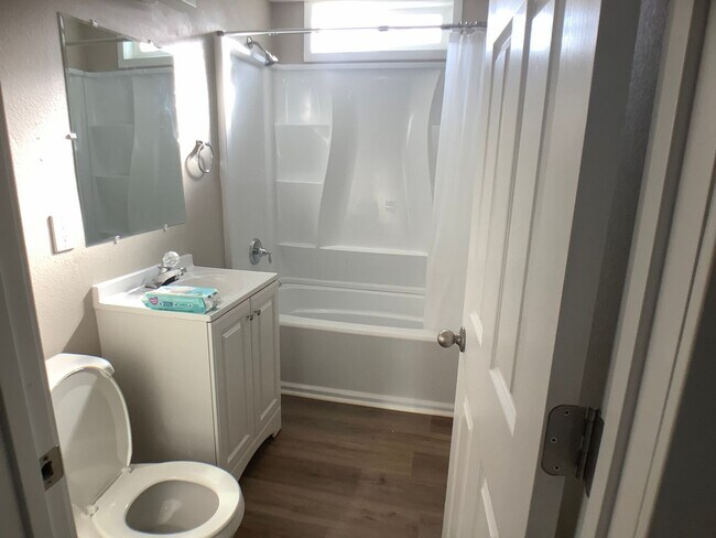 Building Photo - Three bedroom home with large yard| Available July!