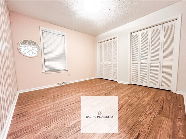 Building Photo - Your Wooded Oasis Awaits