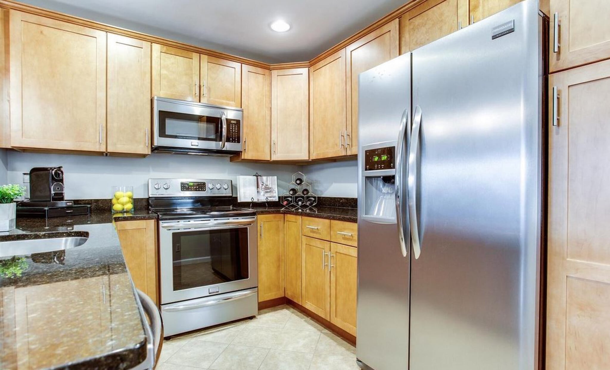 Kitchen with Stainless Steel Appliances and Soft Closing Cabinetry - 2681 Glengyle Dr