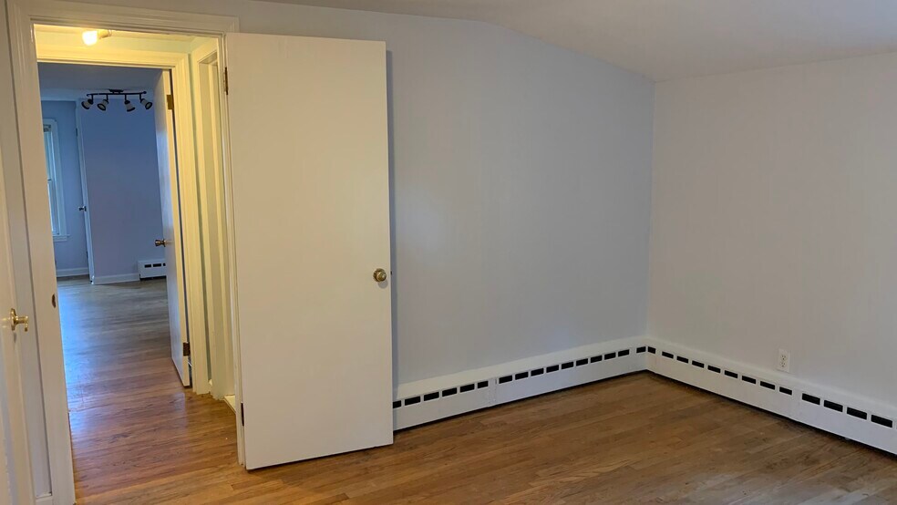 Bedroom 3 - smaller, space re-allocated for large walk-in closet - 58 Oakwood Dr