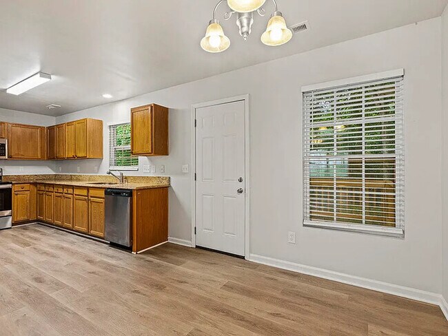Building Photo - Earn Wealth While Leasing - Like a Homeown...