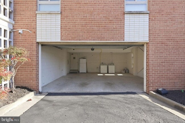 Building Photo - Welcome to this rarely available and beautifully updated ground-level condo offering the perfect ...