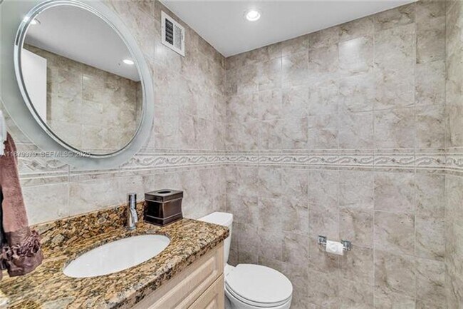 Building Photo - 5005 Collins Ave