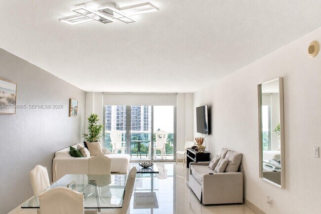 Building Photo - 19370 Collins Ave