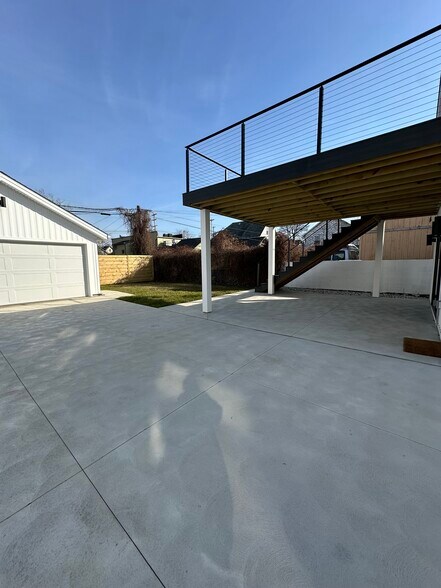 Extra large patio space and back yard - 1285 W 67th St
