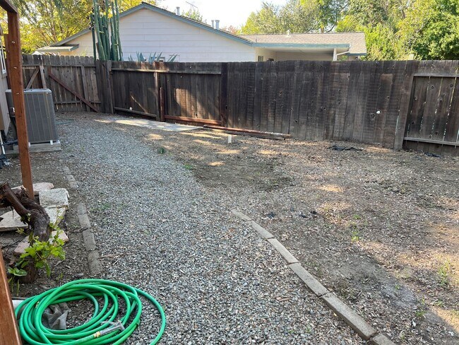 Building Photo - Four bedroom two bathroom home with a pool in Central Davis