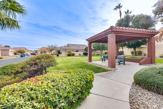 Building Photo - This 4-bedroom, 3-bathroom gem in a gated ...