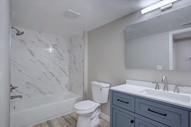 Building Photo - Stunning Top-Floor End Unit with Vaulted Ceilings and Modern Finishes