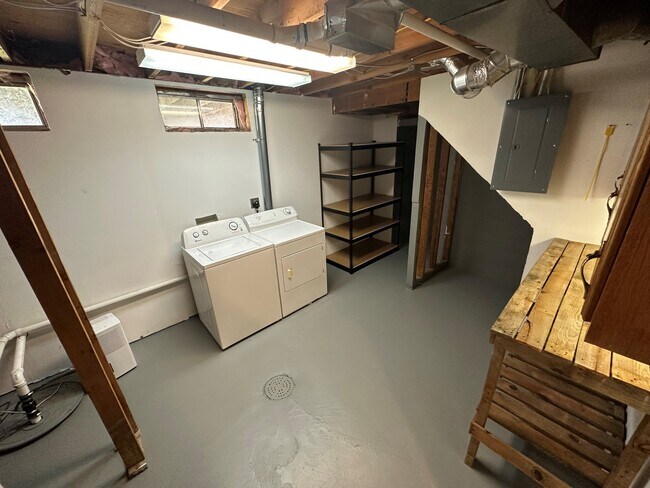 Laundry room with extra storage and bench - 1226 Cherry Pky