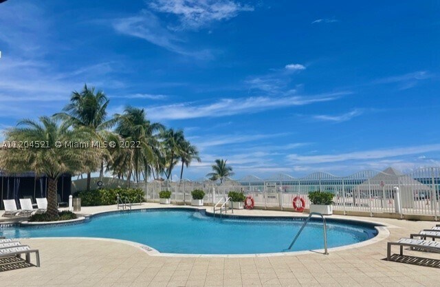 Building Photo - 16699 Collins Ave