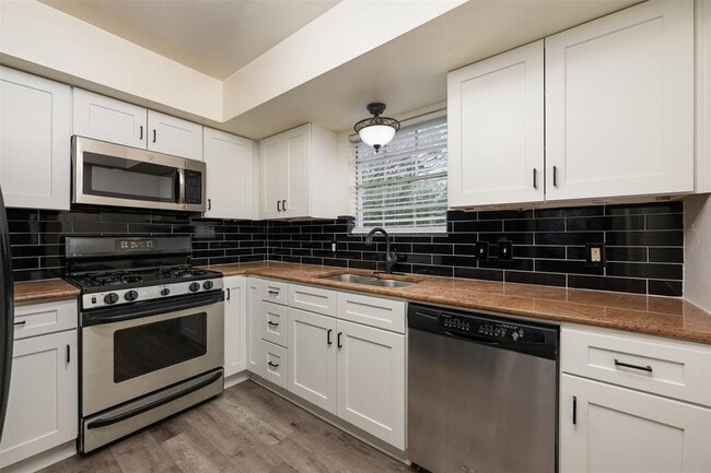 Building Photo - 6107 Bullard Dr